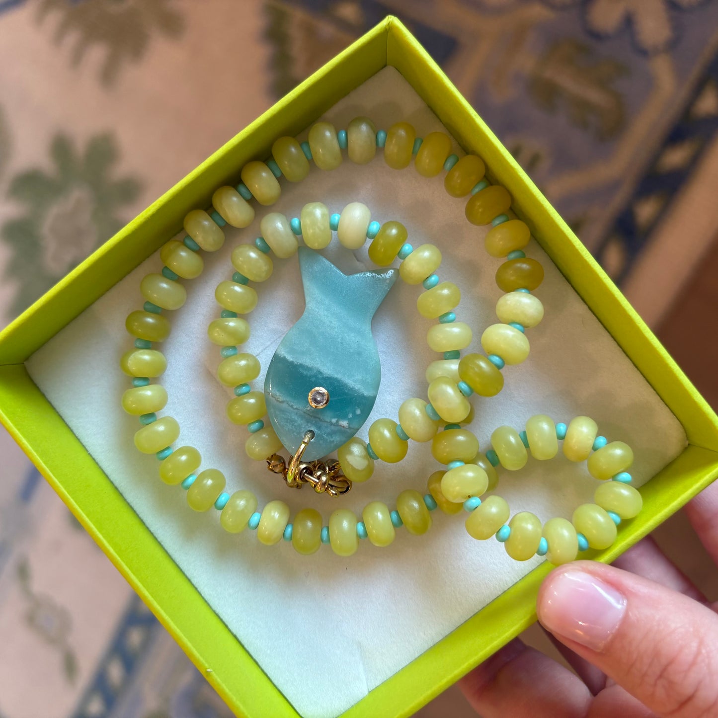 Chartreuse stone necklace with fish charm