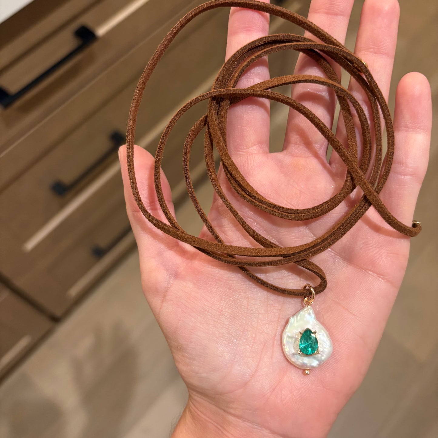 Freshwater pearl necklace with green stone