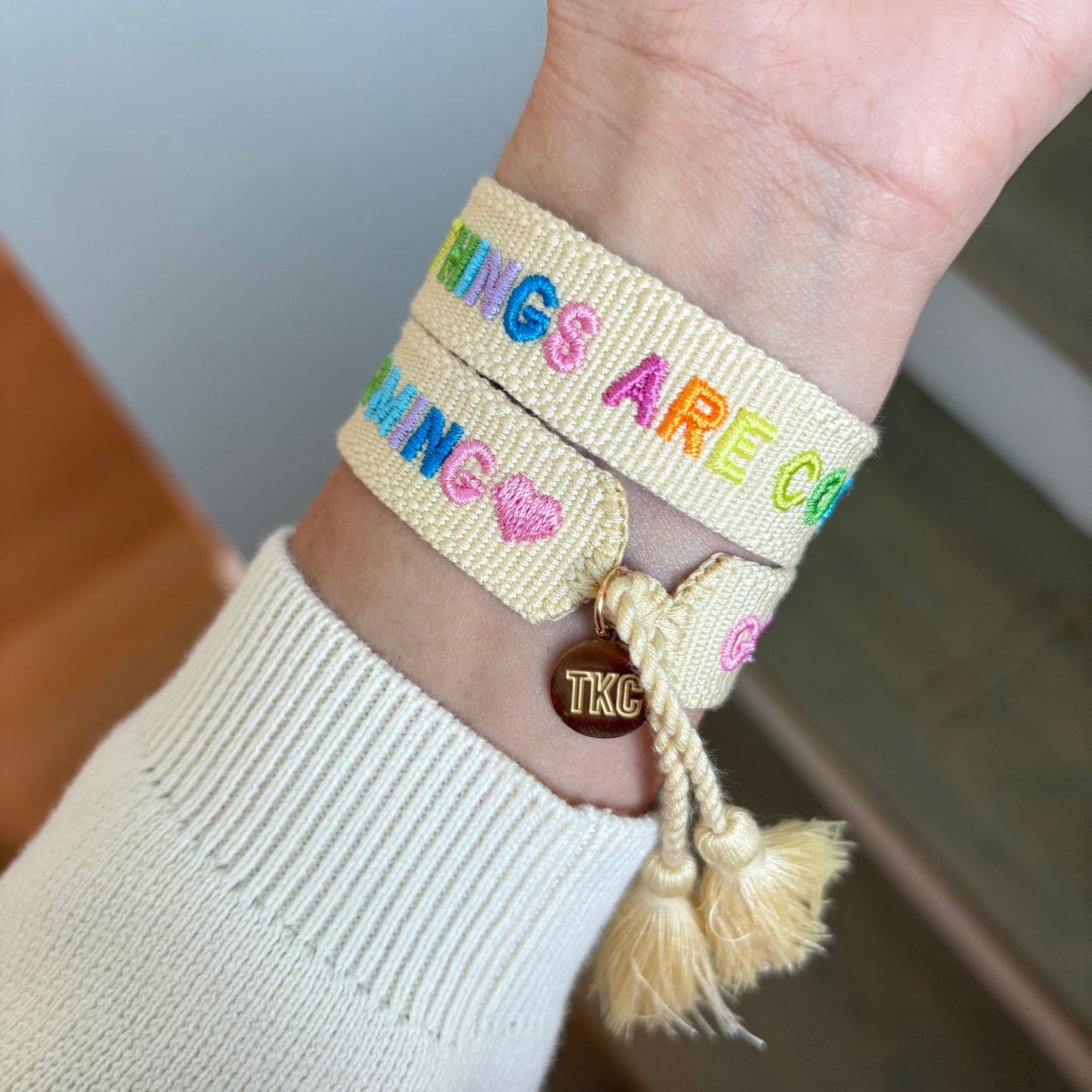 Good things are coming embroidered tassel bracelet