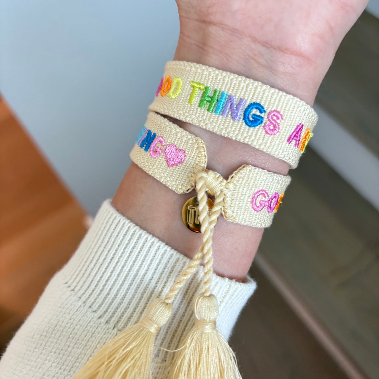 Good things are coming embroidered tassel bracelet