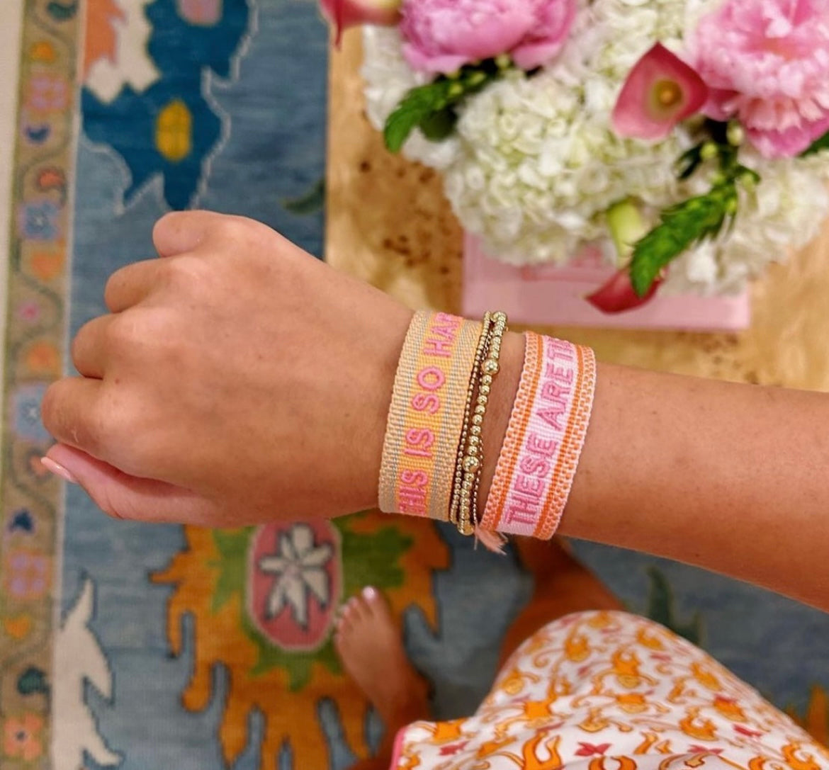 This is so happy embroidered tassel bracelet
