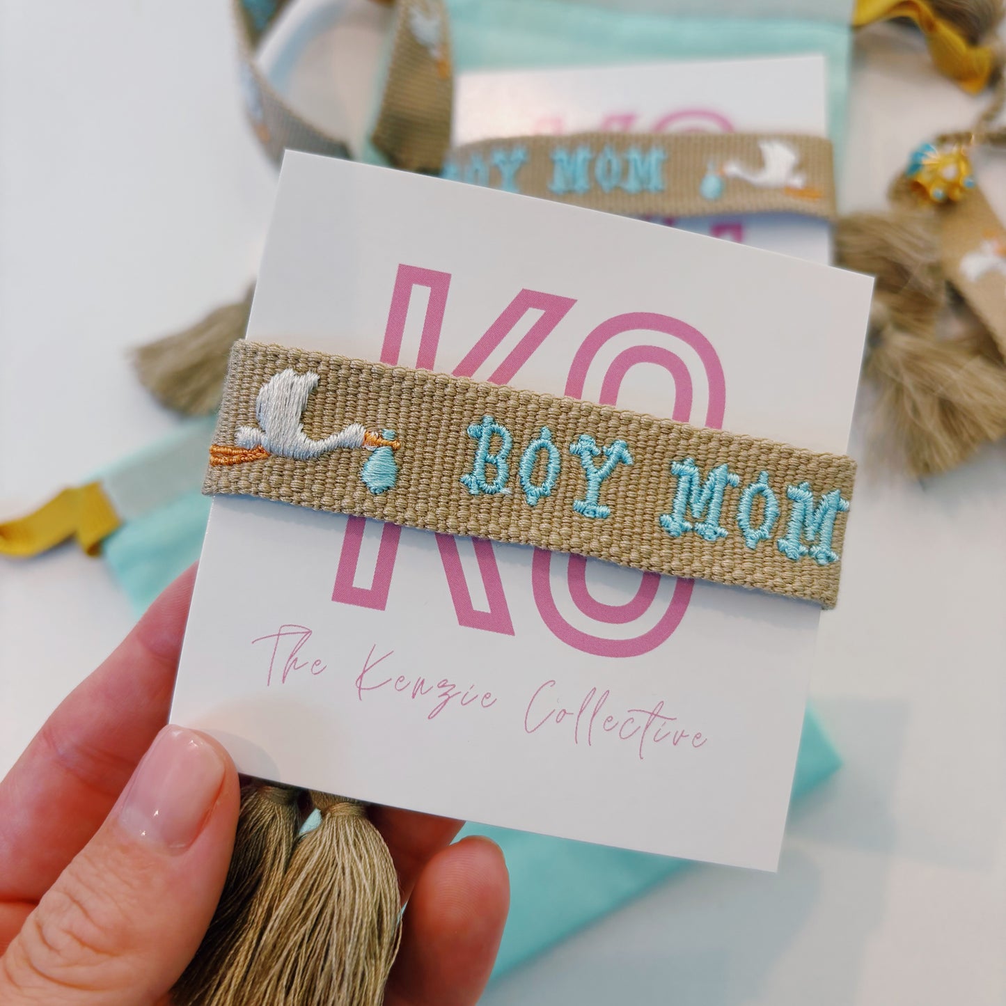 Boy mom embroidered with stork tassel bracelet