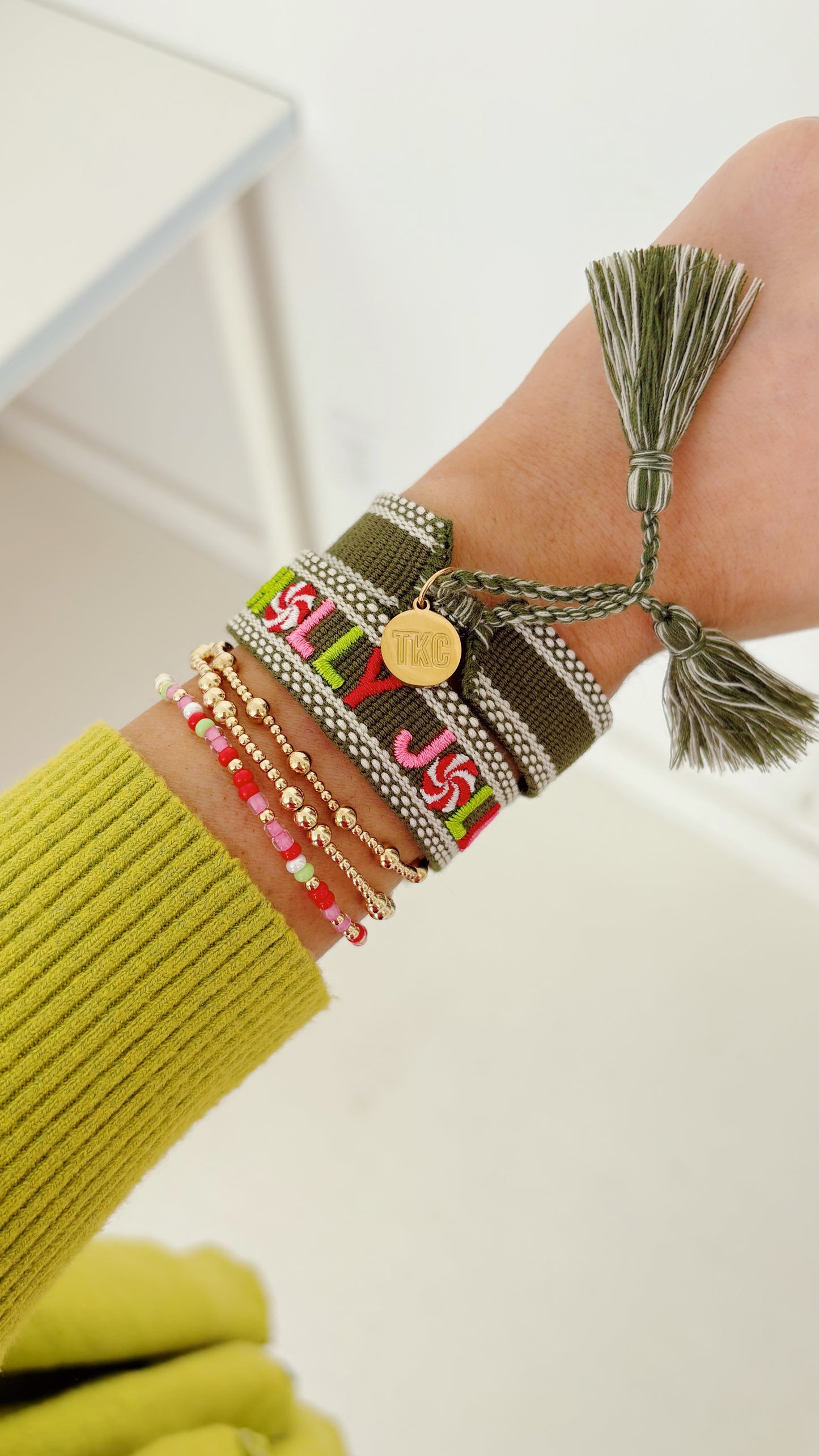 Holly Jolly embroidered tassel bracelet limited edition