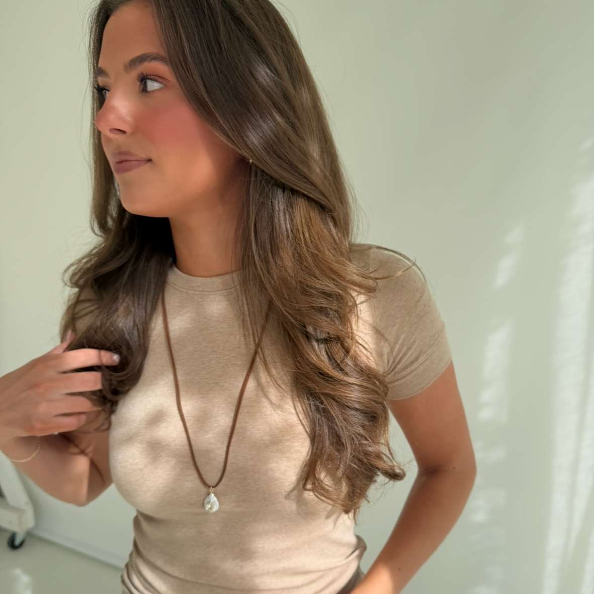 Freshwater pearl necklace with brown stone