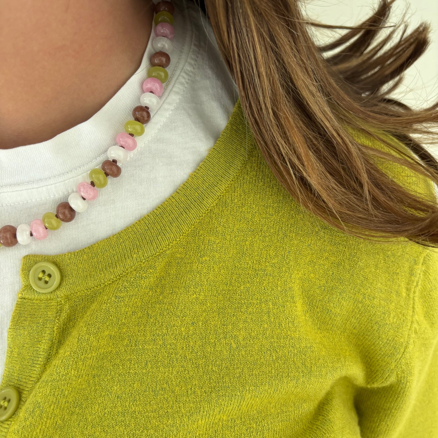 Celia hand knotted necklace chartreuse brown and pink stones