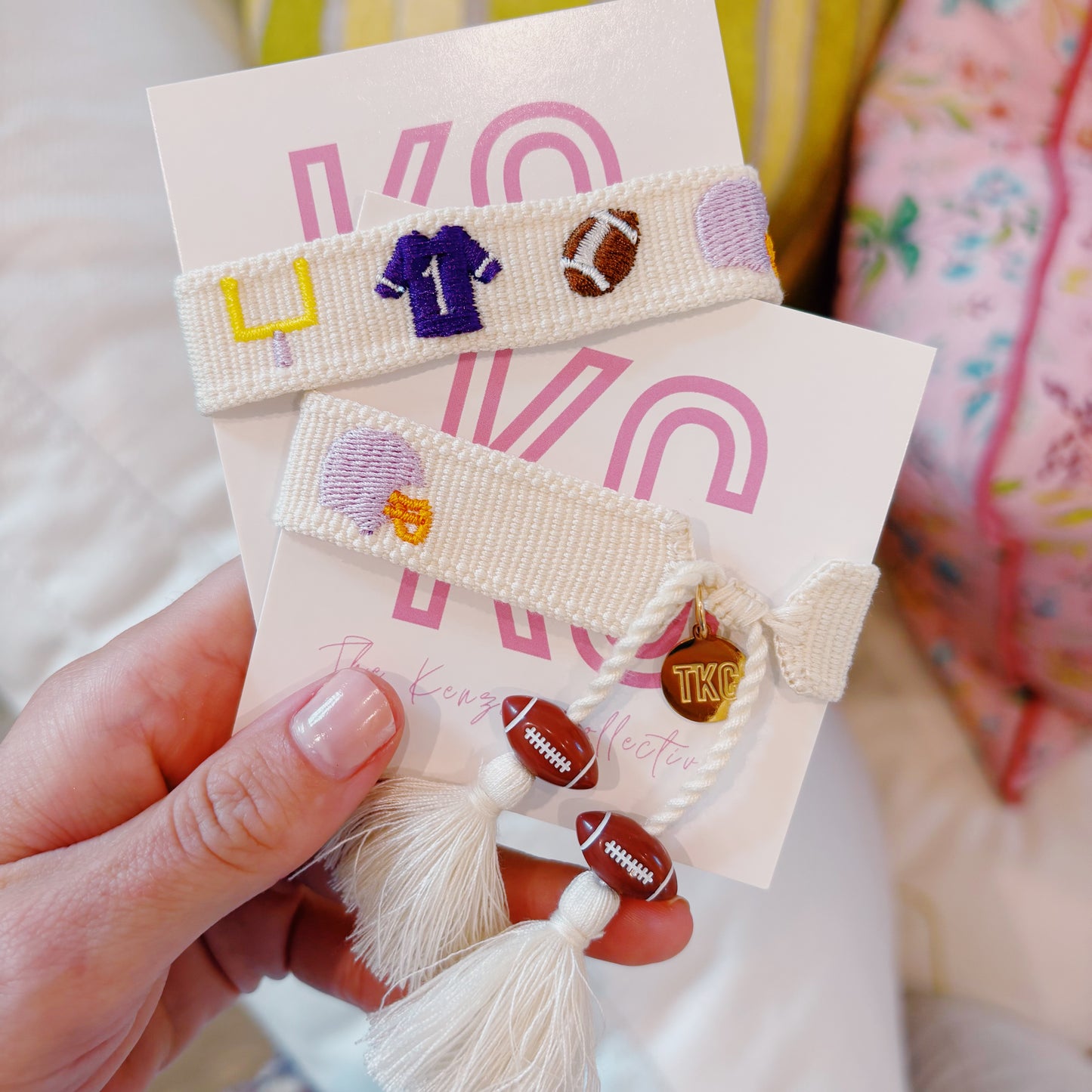 Purple game day spirit bracelet with football charms