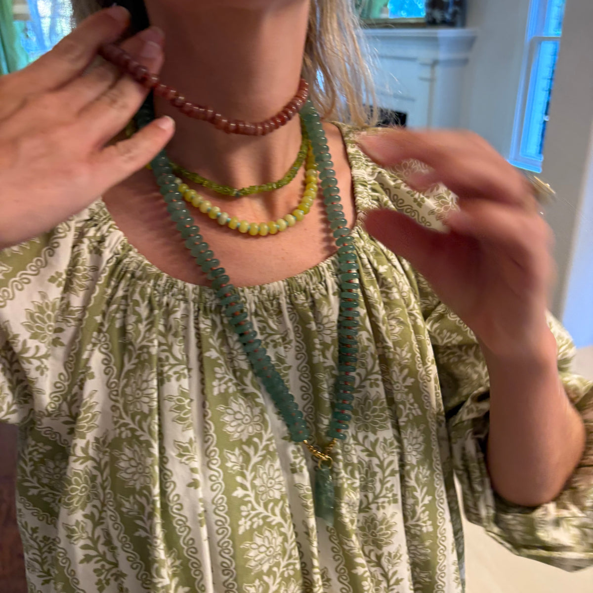 Catch of the day long necklace with green fish charm