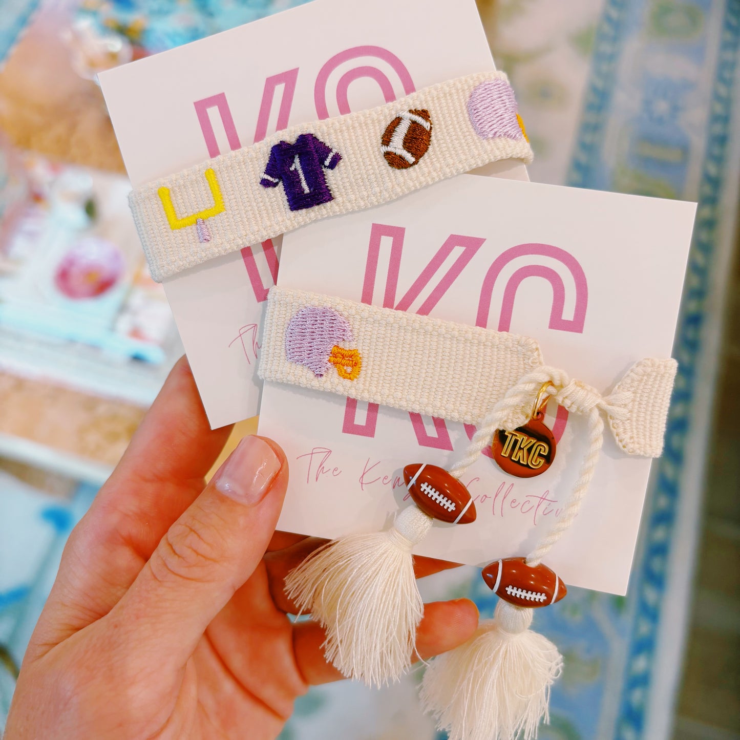 Purple game day spirit bracelet with football charms