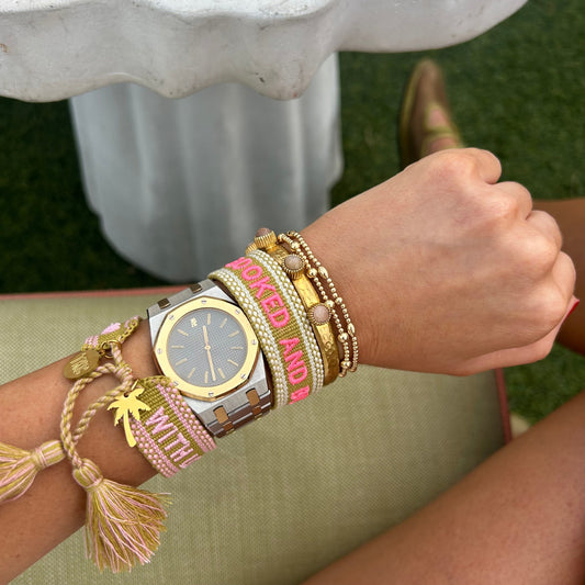 Booked and busy chartreuse tassel bracelet