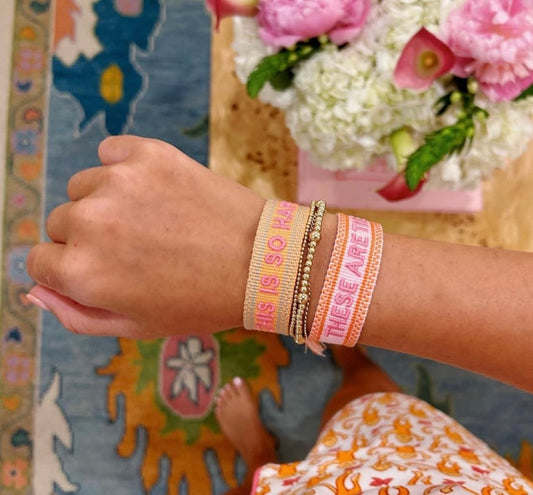 This is so happy embroidered tassel bracelet