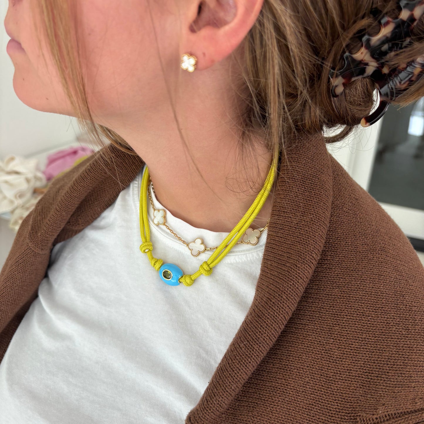 Chartreuse cord necklace with blue stone