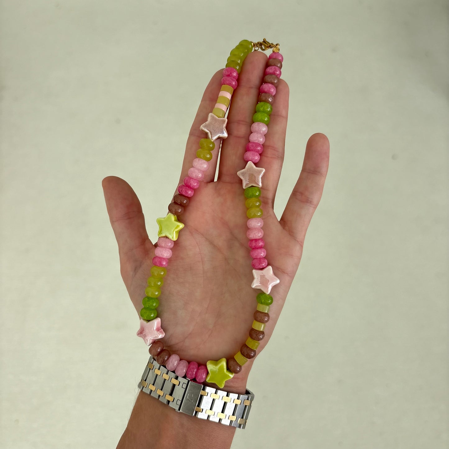 The Celly star necklace - brown chartreuse and pink stones