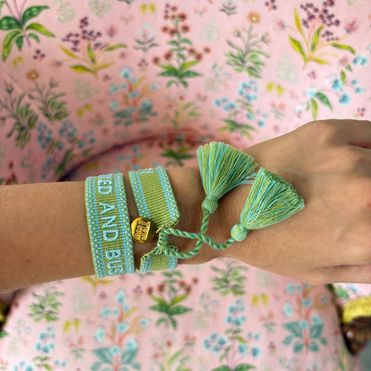 Booked and busy embroidered tassel bracelet green and blue