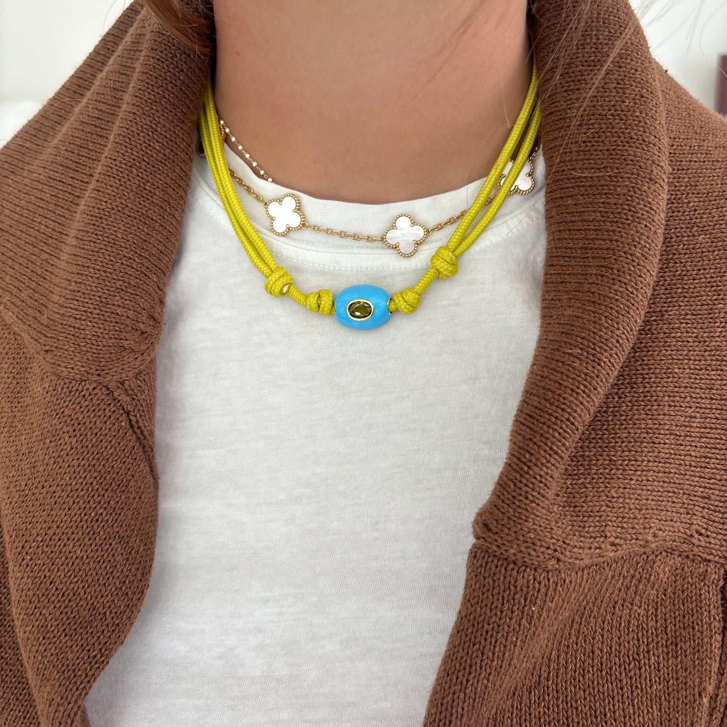 Chartreuse cord necklace with blue stone