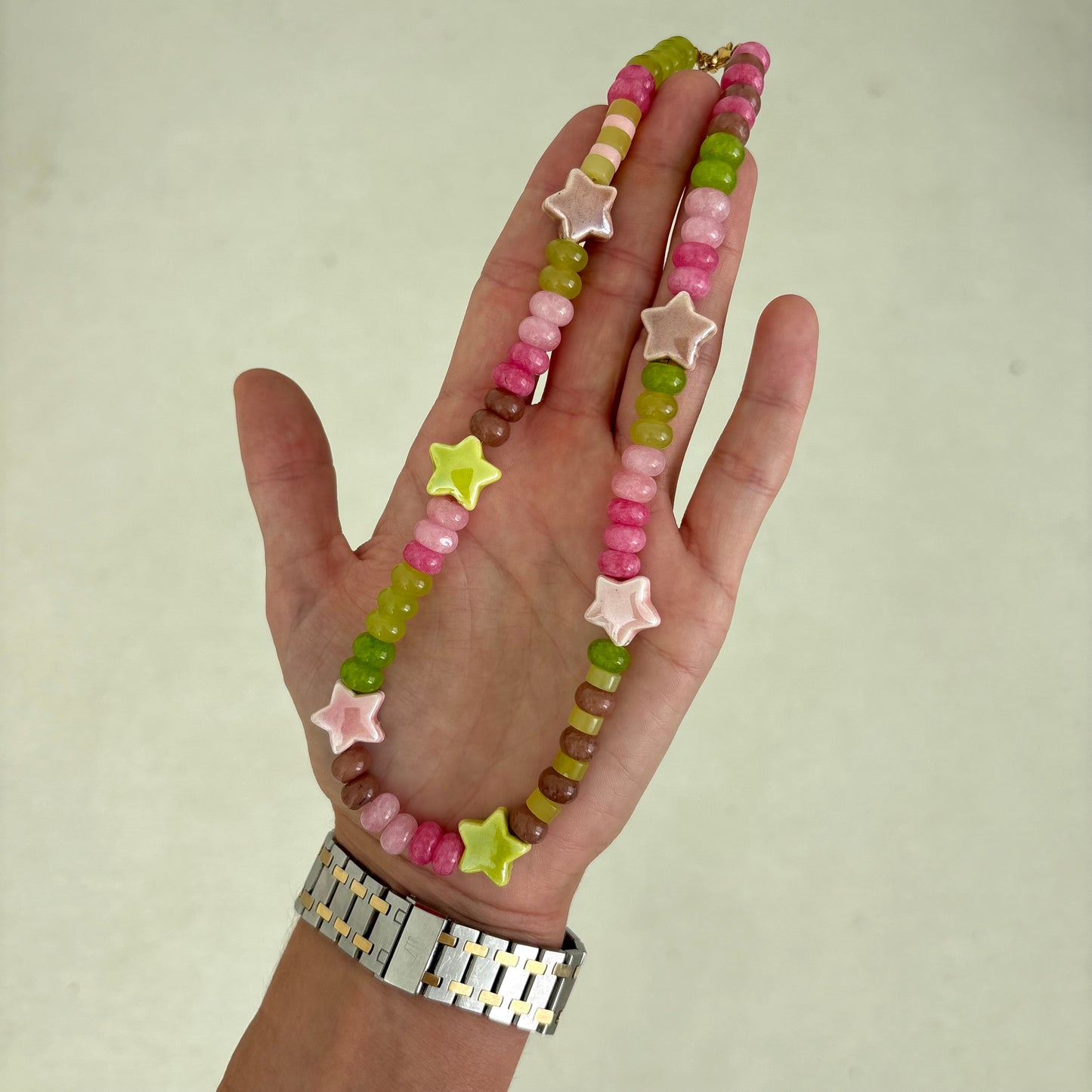 The Celly star necklace - brown chartreuse and pink stones