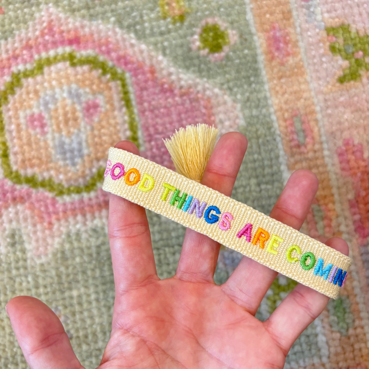 Good things are coming embroidered tassel bracelet