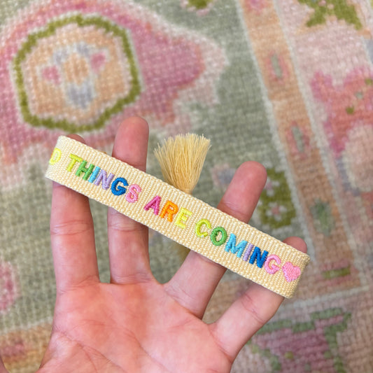 Good things are coming embroidered tassel bracelet