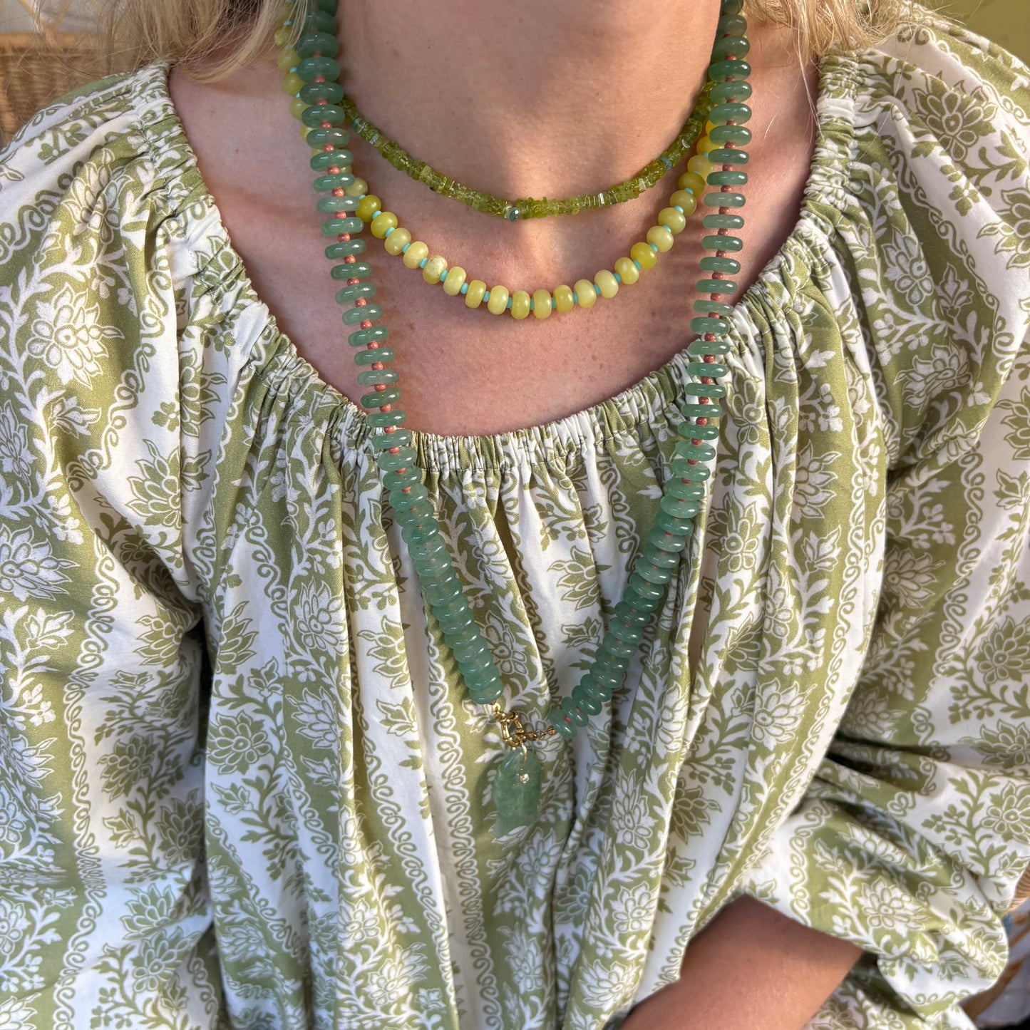 Catch of the day long necklace with green fish charm