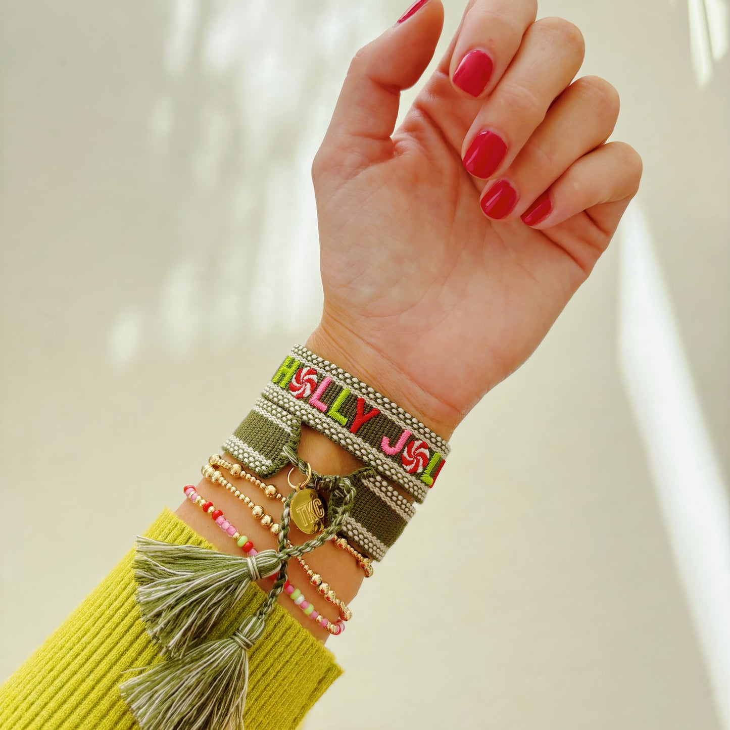 Holly Jolly embroidered tassel bracelet limited edition